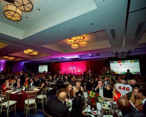 Overhead view of a full ballroom.